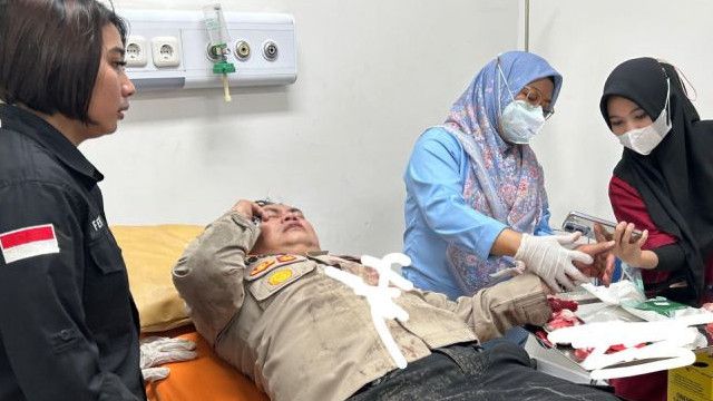 Kapolsek Kemayoran Ditimpa Kaca Pecah Saat  Evakuasi Korban Kebakaran Gedung Terra Drone