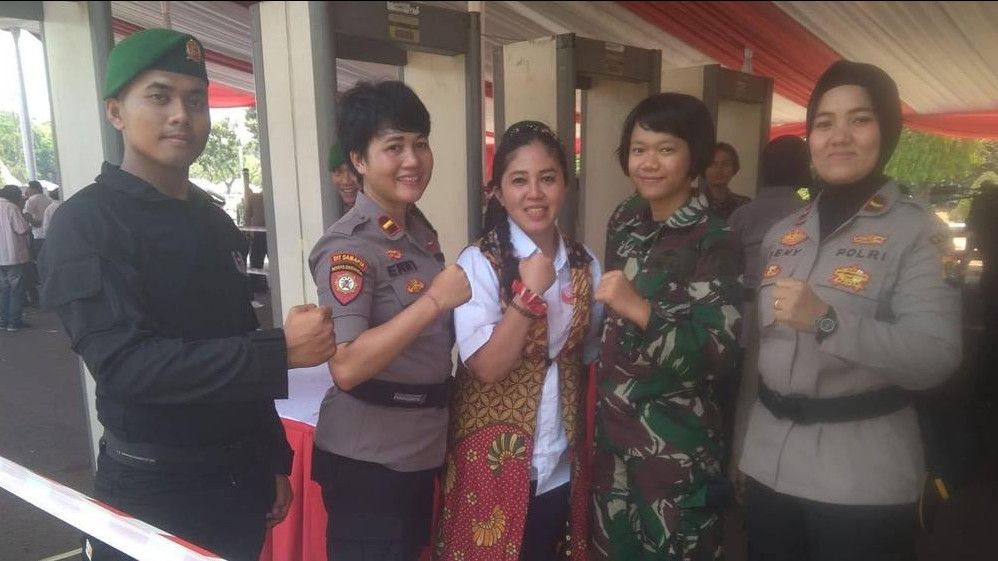 Mengintip Cara Pawang Hujan Kawal Pelantikan Jokowi-Ma'ruf