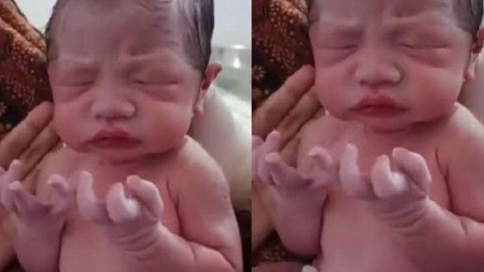 Viral! Bayi Baru Lahir Angkat Tangan Seperti Gerakan Berdoa, Netizen: Semoga Jadi Ulama